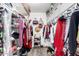Walk-in closet with ample storage and organization space for clothes, handbags, and shoes at 1222 W Baseline Rd # 119, Tempe, AZ 85283