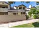 Inviting two-story home featuring a tile roof, private balcony, and well-maintained landscaping at 1222 W Baseline Rd # 119, Tempe, AZ 85283