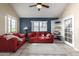 Comfortable living room features vaulted ceilings, a ceiling fan, and tile flooring for easy maintenance at 1222 W Baseline Rd # 119, Tempe, AZ 85283