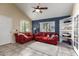 Comfortable living room features vaulted ceilings, a ceiling fan, and tile flooring for easy maintenance at 1222 W Baseline Rd # 119, Tempe, AZ 85283