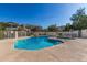 Community pool features a safety fence and is surrounded by well maintained landscaping at 1222 W Baseline Rd # 119, Tempe, AZ 85283