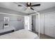Light and airy bedroom showcasing a four-poster bed and ample closet space at 1359 E 12Th St, Casa Grande, AZ 85122