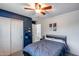 This bedroom features a ceiling fan and a closet at 1359 E 12Th St, Casa Grande, AZ 85122