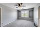 Bedroom features neutral walls, a large window nook, and plush carpeting at 1359 E 12Th St, Casa Grande, AZ 85122