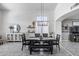 Bright dining room with decorative shiplap accent wall and modern chandelier at 1359 E 12Th St, Casa Grande, AZ 85122