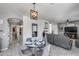Open-concept dining room that seamlessly flows into the kitchen and living room at 1359 E 12Th St, Casa Grande, AZ 85122