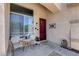 Inviting front porch with seating area and charming decor near the front door at 1359 E 12Th St, Casa Grande, AZ 85122