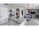 Kitchen with granite countertops, stainless steel appliances, and views of the living room at 1359 E 12Th St, Casa Grande, AZ 85122