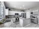 Well-lit kitchen with stainless steel appliances, a center island, and stylish countertops at 1359 E 12Th St, Casa Grande, AZ 85122