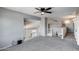 Spacious loft area with neutral walls, carpeted flooring and natural light at 1359 E 12Th St, Casa Grande, AZ 85122