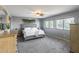 Spacious main bedroom with ceiling fan and large windows at 1359 E 12Th St, Casa Grande, AZ 85122
