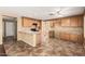 Spacious eat-in kitchen with ample counter space and light wood cabinetry at 1403 W Goldfinch Way, Chandler, AZ 85286