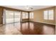 Bright living room with a view of the backyard pool area and sliding glass doors at 1403 W Goldfinch Way, Chandler, AZ 85286