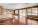 Open-concept living area with access to the pool area through sliding glass doors at 1403 W Goldfinch Way, Chandler, AZ 85286