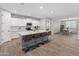 Spacious kitchen with a large island, stainless steel appliances, and seating for four at 14274 W Sand Hills Rd, Surprise, AZ 85387