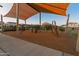 Community park featuring playground with sunshade, providing a safe and enjoyable outdoor space for children at 14274 W Sand Hills Rd, Surprise, AZ 85387