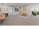 Spacious playroom with neutral walls, soft carpet, and play equipment at 14274 W Sand Hills Rd, Surprise, AZ 85387