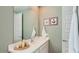 Charming bathroom with double vanity and large mirror, enhanced by stylish lighting and elegant decor at 1482 W Ridge Rd, Apache Junction, AZ 85120