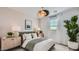 Serene bedroom with a nature-inspired design, soft textiles, and ample natural light for relaxation and comfort at 1482 W Ridge Rd, Apache Junction, AZ 85120