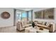 Cozy living room with neutral tones, comfortable seating, and natural light at 1482 W Ridge Rd, Apache Junction, AZ 85120