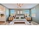 Serene main bedroom with stylish furnishings, soft lighting, and a calming color scheme at 1482 W Ridge Rd, Apache Junction, AZ 85120