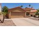 Inviting single-story home with a two-car garage and desert landscaping at 1534 E Mineral Rd, Gilbert, AZ 85234