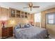 Bedroom features overhead cabinets for storage and ample space at 17200 W Bell Rd # 2189, Surprise, AZ 85374