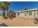 This home has a covered patio and a gravel yard, offering a low-maintenance outdoor living experience at 17200 W Bell Rd # 2189, Surprise, AZ 85374