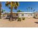 This charming home features a covered patio and a gravel yard, creating a relaxing outdoor space at 17200 W Bell Rd # 2189, Surprise, AZ 85374