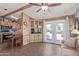 Living room with table and chairs and access to kitchen at 17200 W Bell Rd # 2189, Surprise, AZ 85374