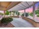Charming covered patio offering backyard views, seamlessly blending indoor-outdoor living and beauty at 17911 N Adobe Mesa Ct, Surprise, AZ 85374