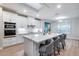 Bright, updated kitchen with a large island, sleek countertops, and stainless steel appliances at 17911 N Adobe Mesa Ct, Surprise, AZ 85374