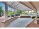 Inviting covered patio with views of the serene backyard offers relaxing outdoor enjoyment at 17911 N Adobe Mesa Ct, Surprise, AZ 85374