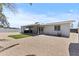 Charming backyard featuring low maintenance gravel and covered patio space at 2106 W 8Th Ave, Mesa, AZ 85202