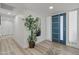 Inviting entryway with a modern door, stylish decor, and sleek flooring at 2106 W 8Th Ave, Mesa, AZ 85202