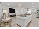 Open-concept living room features a fireplace, modern lighting, and seamless flow to the kitchen at 2106 W 8Th Ave, Mesa, AZ 85202