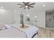 Relaxing primary bedroom boasts en-suite bath, natural light, and cozy furnishings at 2106 W 8Th Ave, Mesa, AZ 85202