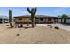 Single story home featuring a low maintenance desert landscape, covered parking, and desert flora at 2118 W Cactus Wren Dr, Phoenix, AZ 85021