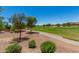 Picturesque golf course view showcasing the community's beautiful landscaping and outdoor recreation at 22403 W Harrison St, Buckeye, AZ 85326