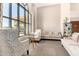 Inviting living area with large window, stylish seating, and decorative accents at 22403 W Harrison St, Buckeye, AZ 85326