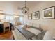 Chic dining area with a modern table, pendant lighting, and an open view to the kitchen at 2520 N 15Th St, Phoenix, AZ 85006