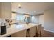 Spacious kitchen with a large island, white countertops, and stainless steel appliances at 2520 N 15Th St, Phoenix, AZ 85006