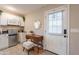 Charming kitchenette featuring stainless steel appliances, white cabinets, and a convenient workspace at 2520 N 15Th St, Phoenix, AZ 85006