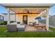 Covered patio featuring comfortable seating, a ceiling fan, a picnic table and string lights at 2520 N 15Th St, Phoenix, AZ 85006
