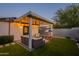 Outdoor patio area with lounge furniture, a picnic table, and string lights for ambiance at 2520 N 15Th St, Phoenix, AZ 85006