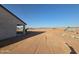 Spacious, undeveloped backyard with potential for landscaping and outdoor activities at 28151 N Faded Creek Dr, Florence, AZ 85132