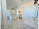 Bathroom with double vanity, marble floors, shower and walk-in closet at 28151 N Faded Creek Dr, Florence, AZ 85132