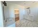 Bright bathroom with double vanity, marble floors, shower and walk-in closet at 28151 N Faded Creek Dr, Florence, AZ 85132