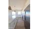 Beautiful eat-in kitchen features quartz countertops, stainless steel appliances, and large island at 28151 N Faded Creek Dr, Florence, AZ 85132