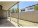 Covered back patio with a view of the yard and fencing at 3415 N 36Th St # 3, Phoenix, AZ 85018